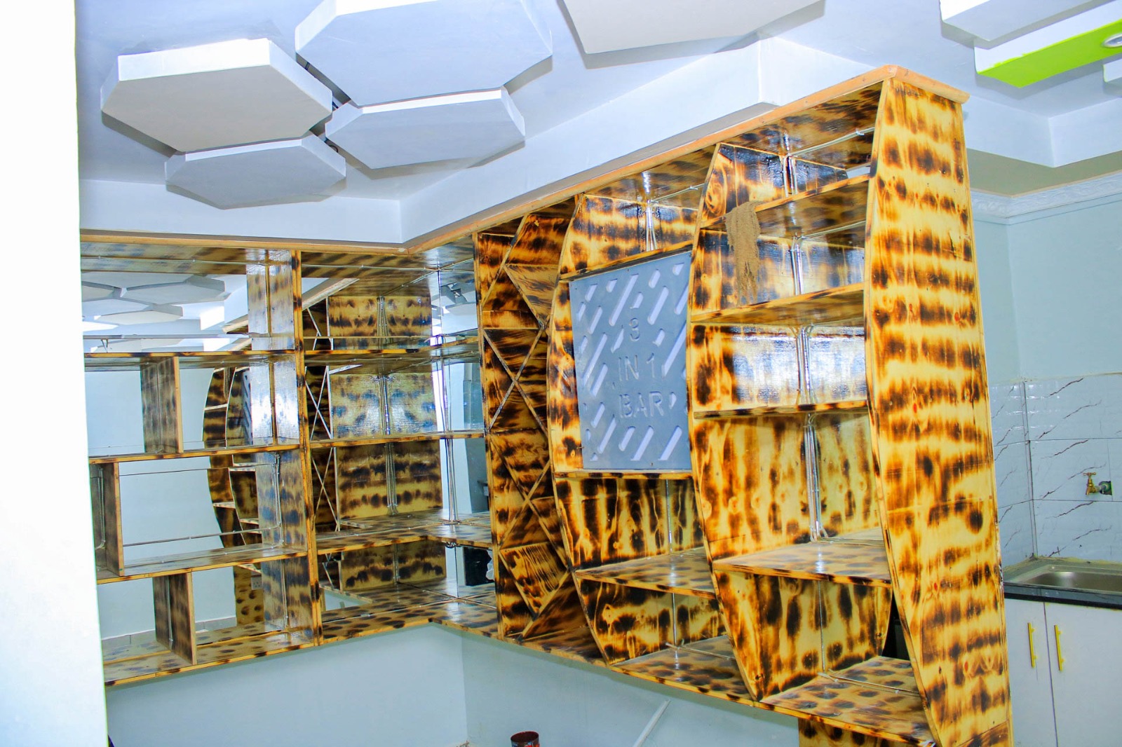 Decorative mirrored shelving inside Three In One